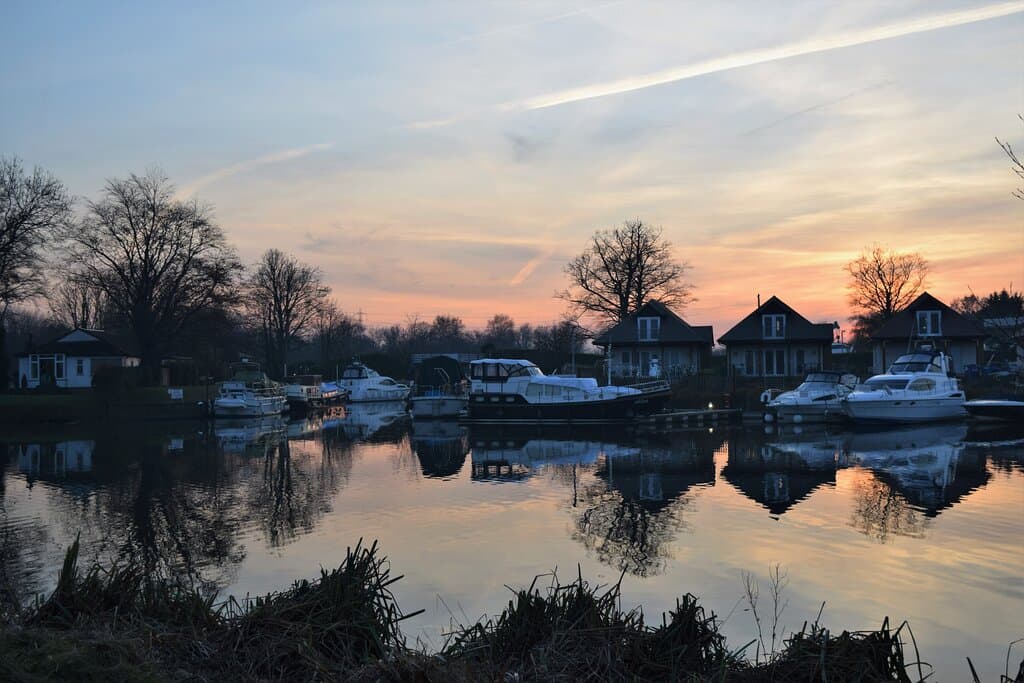 Sunset reflections on the Thames viewed from Dumsey Meadow