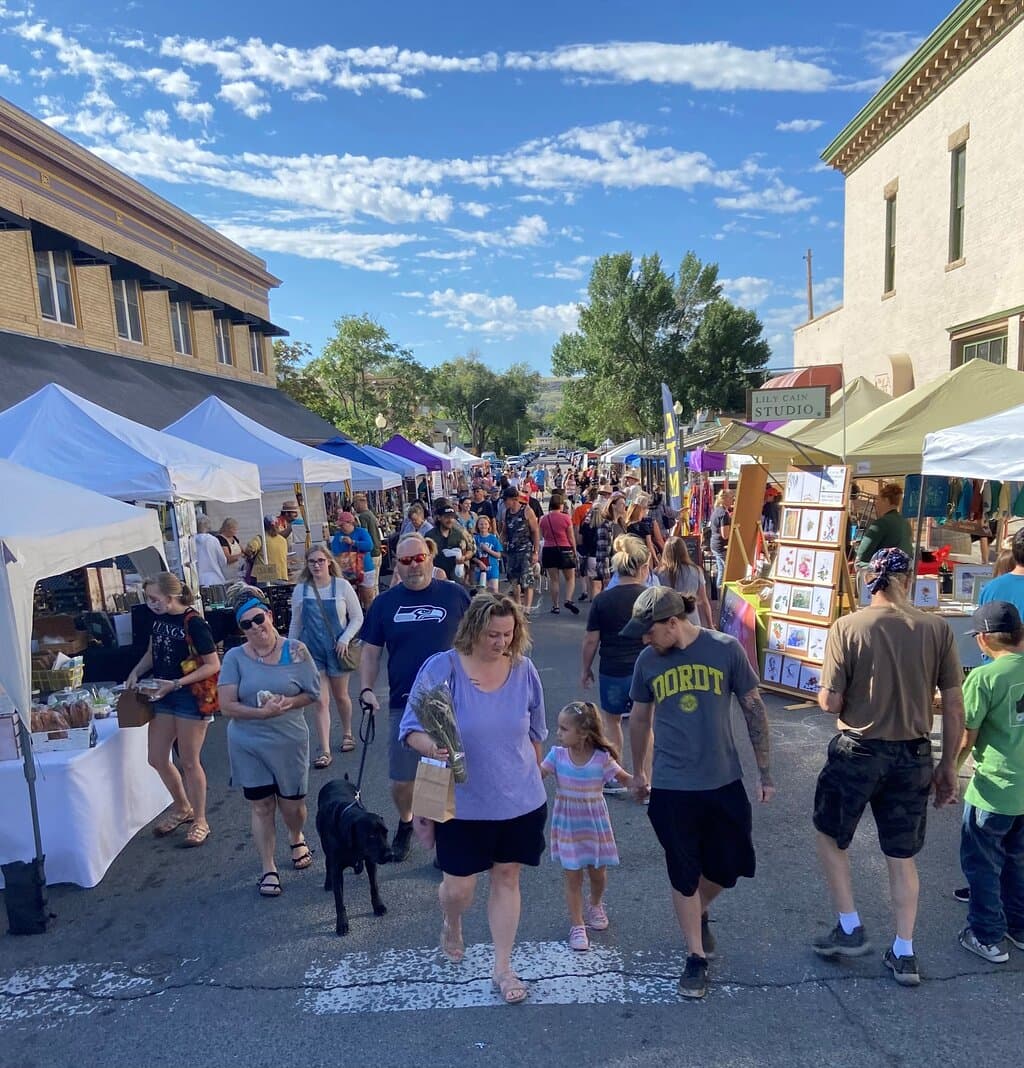 What a beautiful day!  We are now looking down South Main Street, still in the center of the market.  You can't see it from here, but make your way down to Peche for some fresh-bakes sourdough, and get some coffee from Cygnus Crossing's VW Bus!