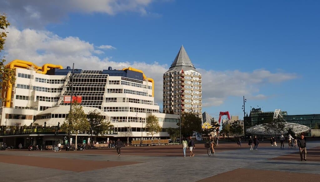 A view of Rotterdam. The Public Library at far left and Rotterdam Blaak Station at right.