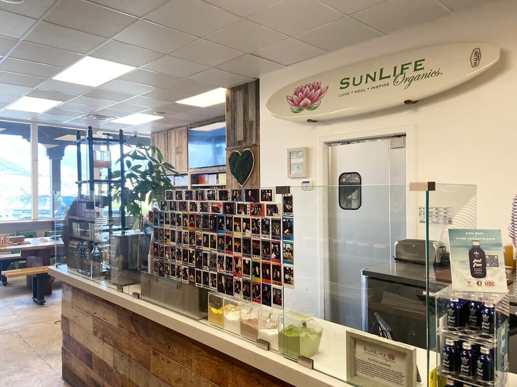 Sick surfboard overhead!! The polaroids are of the team members and guests! Looks pretty fun working here. 