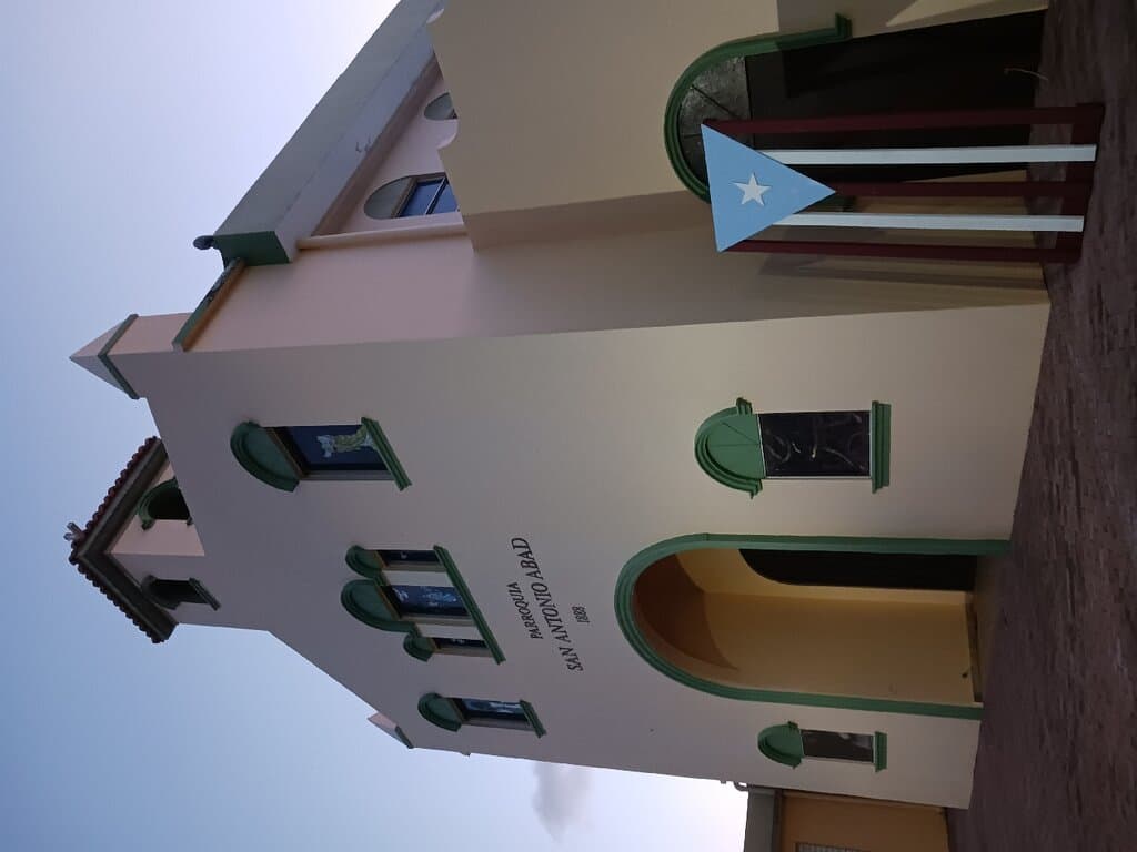 On the west side of the town square.