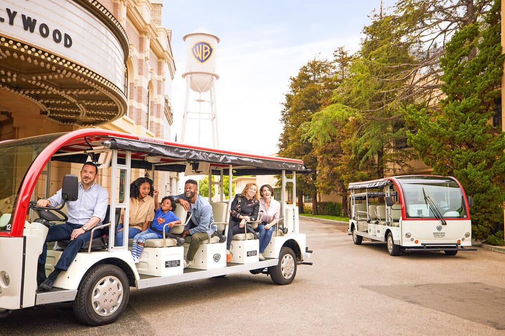 Warner Bros. Studio Tour cart passing by WB Water Tower.