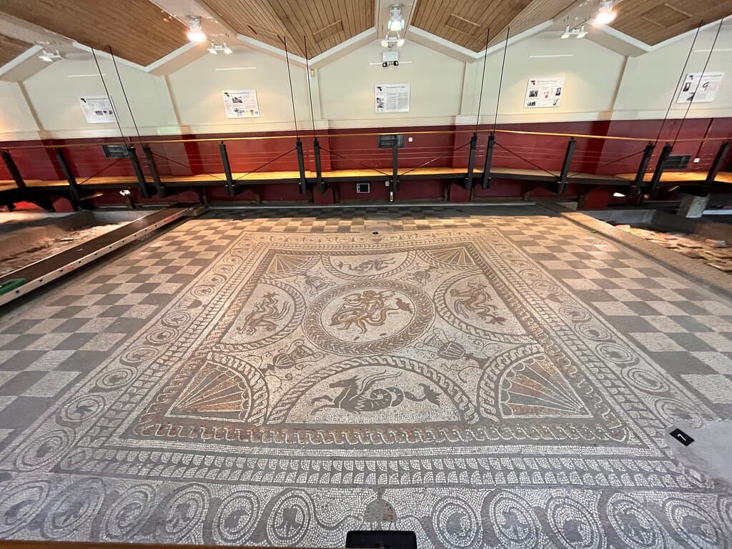 Cupid and dolphin mosaic