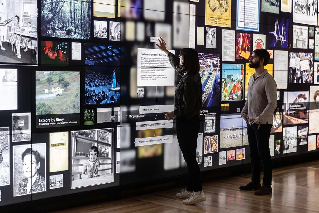 Photograph taken of interactive wall in Connections / Mura gadi: archives, people, place