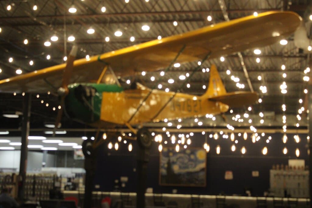 Airplane hannging near the bar