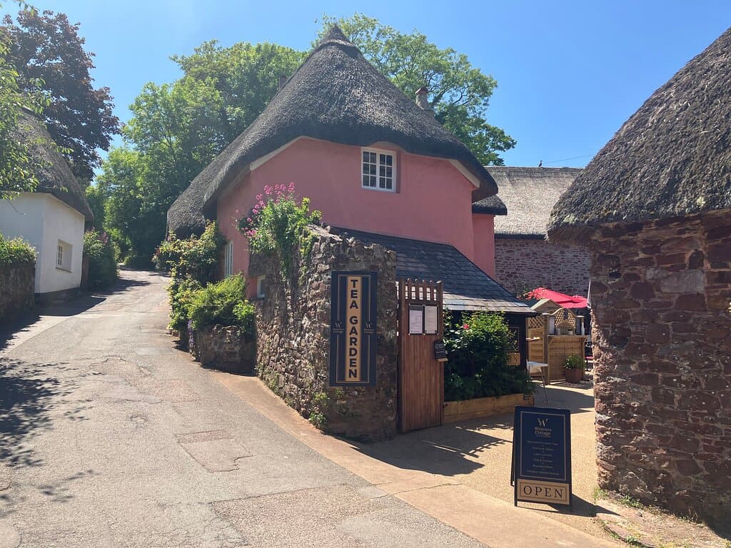 Weavers Cottage is in the centre of the beautiful Cockington Village, just a mile from Torquay and the sea-front. Our garden has over 50 covers where we provide table service at cafe prices!