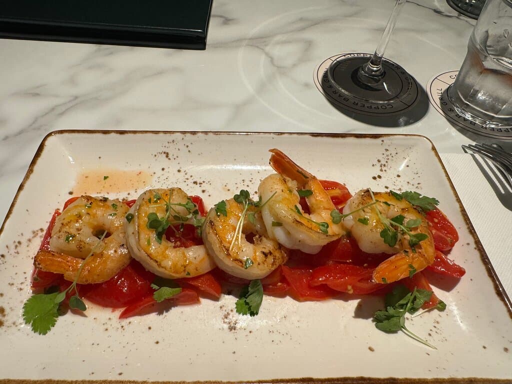 Tiger prawn entree: absolutely delicious! Prawns were very fresh and perfectly cooked, and the tomato bed they were on was sublime.