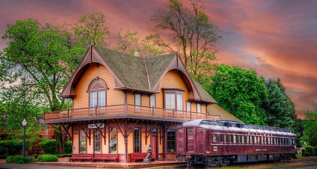 The Historic Depot with the Pullman Car parked on the tracks.