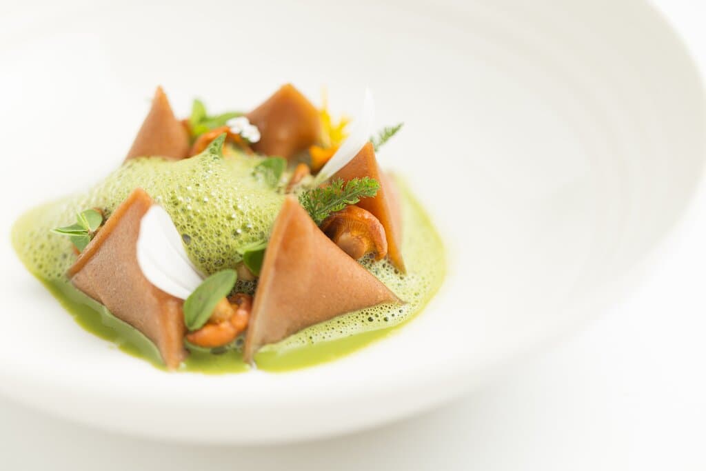 Les Berlingot ASP© Sobacha Pasta Filled with Brie de Meaux AOP  Mushroom Consommé infused with Tonka Bean