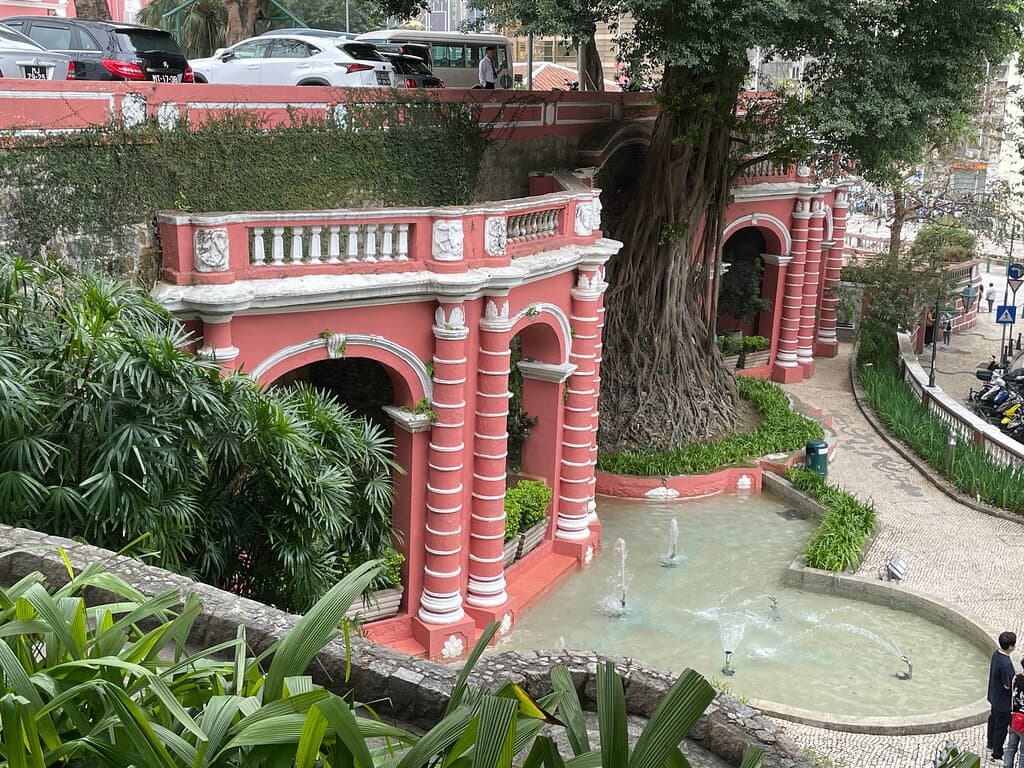 Jardim do Sao Francisco  - lovely fountain pools backed with Neo-classical structures and pink & white colour scheme that matches the Military Club next to the garden.