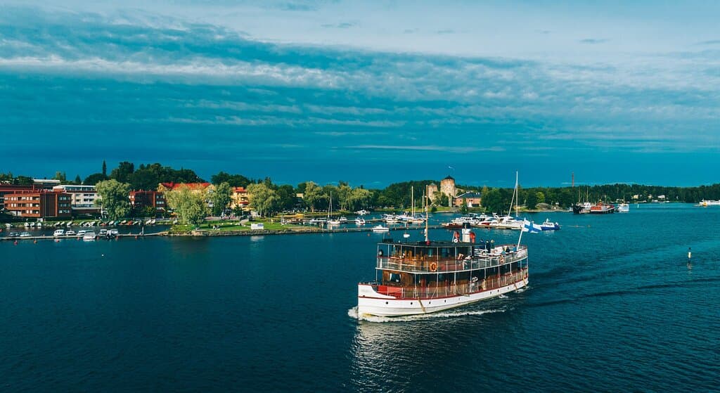 Steam ship and castle Savonlinna