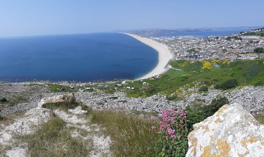 The view of Chesil beach between Weymouth and the Isle of Portal, taken from Portland heights on the Isle of Portland