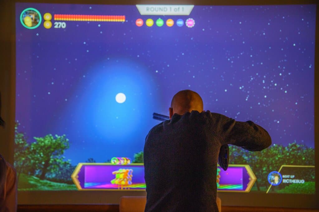 A guest taking a shot at our games in Night Mode!