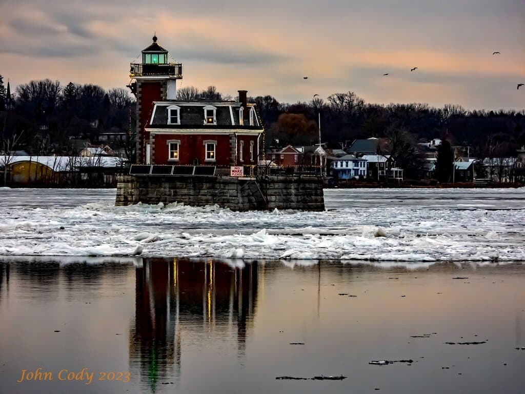 Hudson-Athens Lighthouse in the winter by John Cody