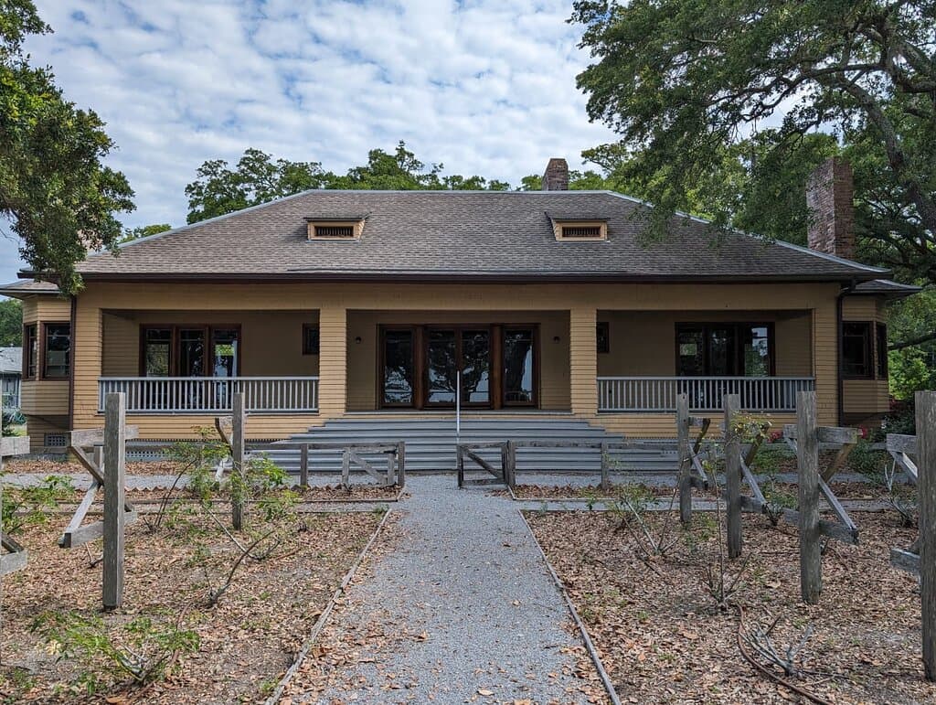 Front shot of the house with the rose garden