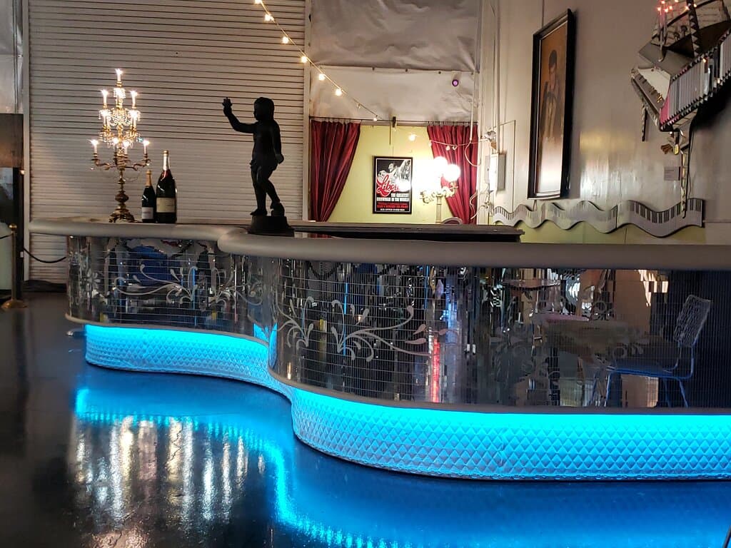 The historic Liberace Piano Bar was preserved by the Liberace Foundation when the entertainer's restaurant was demolished in 2024.  This spectacularly restored 30-ft long artifact is now the catering bar for your next event at Liberace Garage!
