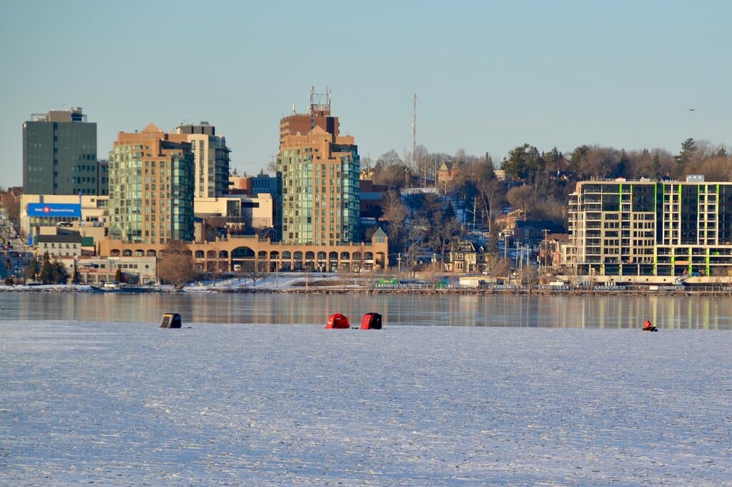 Downtown skyline and fish huts during Winter