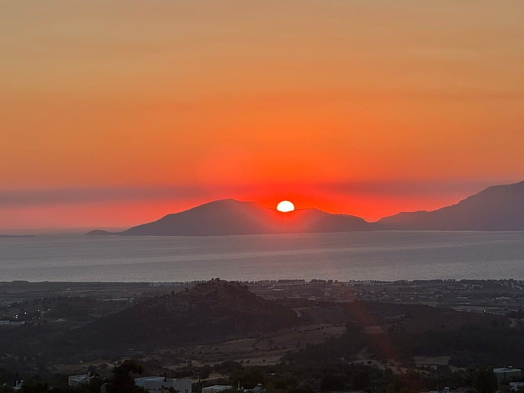 Sunset view from the famous Zia village balcony view point