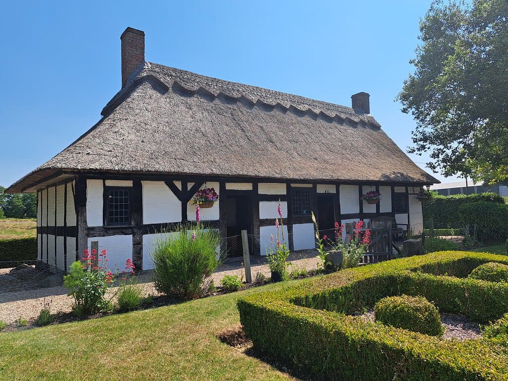 The exterior of Izaak Walton's Cottage, taken from the garden, on a sunny, summers day.