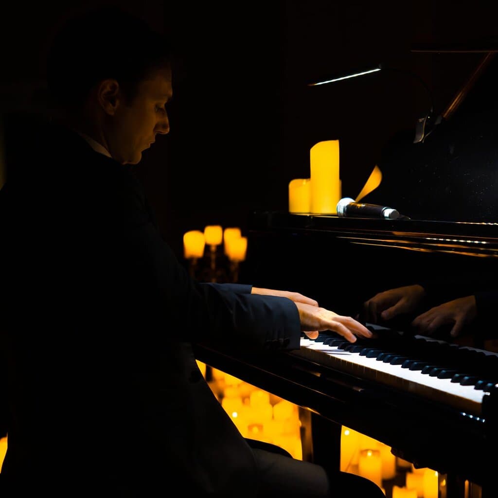 A pianist performs during a Candlelight classical music concert in Ghent (Belgium)