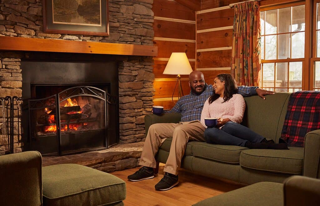 Cozy log cabin with fireplace at Natural Bridge State Resort Park