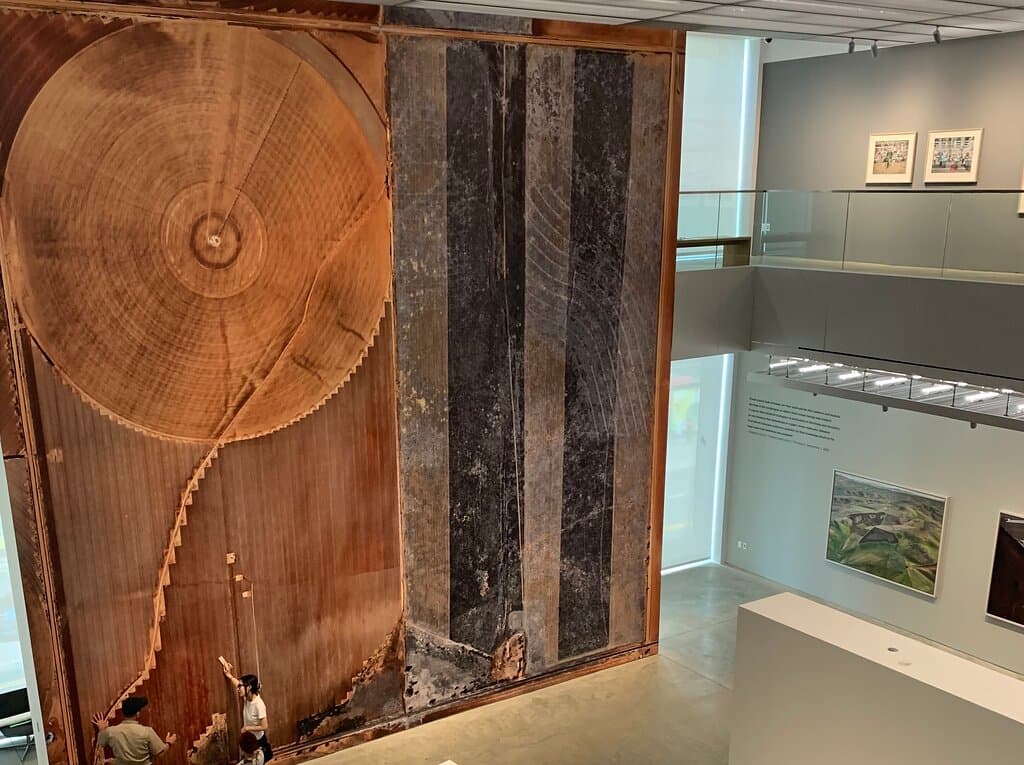 Edward Burtynsky's The Great Accelaration will be on show from June 19 until September 28.  This photo shows a two-story print that depicts the impact of modern farming on the landscape.