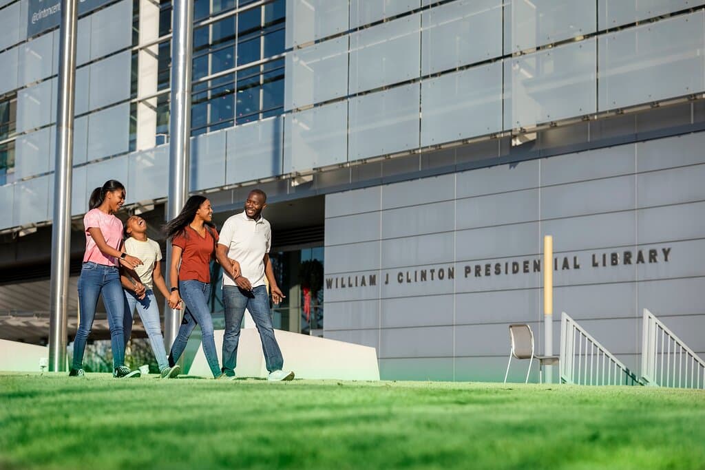 A family explores the Clinton Presidential Park.