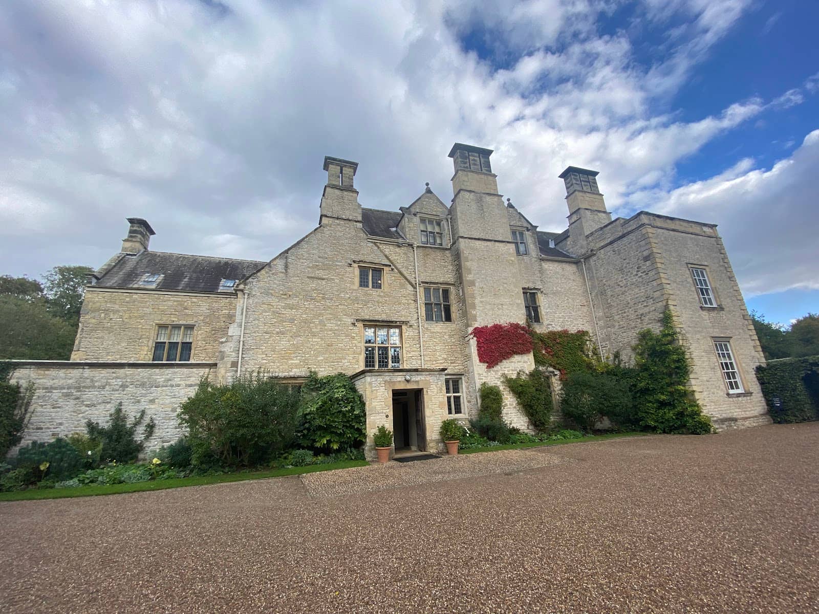 Peacocks and Riverside Charm