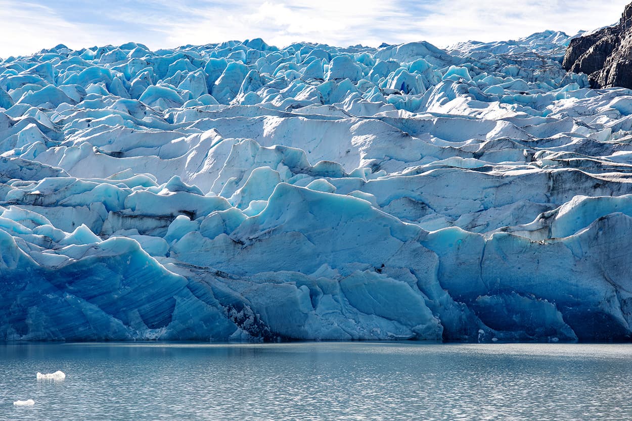 Grey Beach and Icebergs - Image 1