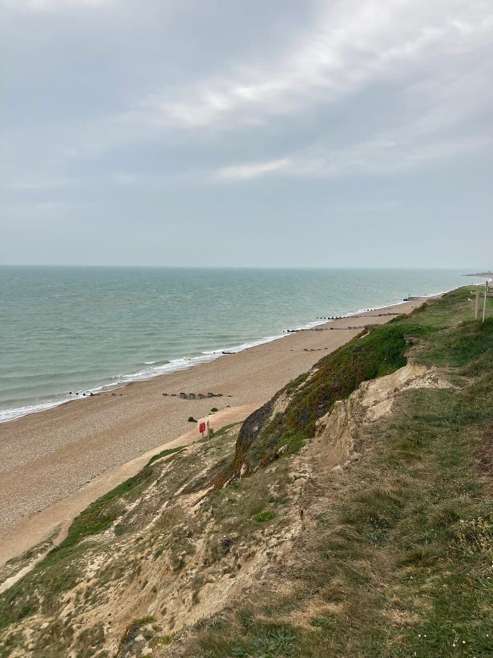 18. Glyne Gap Beach, Bexhill, East Sussex (May 2022); view of the beach from Galley Hill looking towards Bexhill