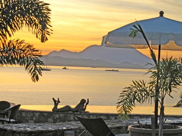 Palms Court Gardens - sunset view from pool