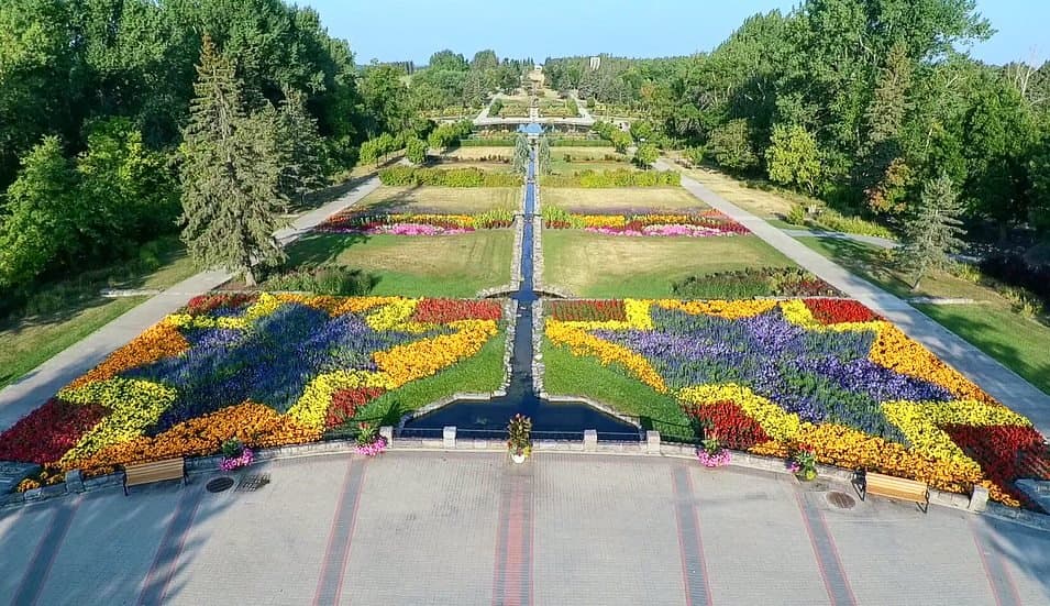 Ariel view of the International Peace Garden hosting more than 80,000 annuals and perennials in the formal gardens. The center canal marks the international border between the U.S. and Canada.