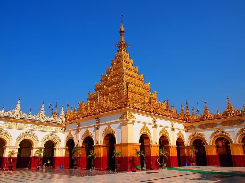 The Mahamuni Pagoda or Mahamuni Buddha temple is one of the most important Buddhist pilgrimage sites in Burma. The temple houses the Mahamuni Buddha image, the most highly revered Buddha image in the country. The pagoda was built in 1785 by King Bodawpaya of the Konbaung dynasty after the Mahamuni image was captured during the invasion of the Arakan Kingdom.