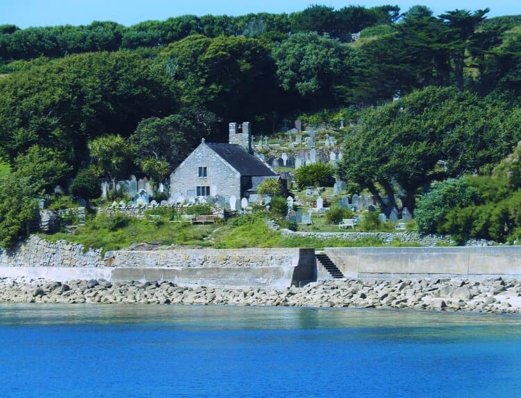 St Mary's Old Town Church, Isles of Scilly - seen across the bay from Old Town