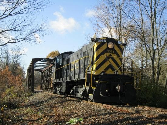 Walt Payack waving as he stopped the train for a pic with the old 1896 Bridge