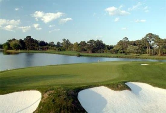 18th green looking toward the water that you must hit over on your approach shot.