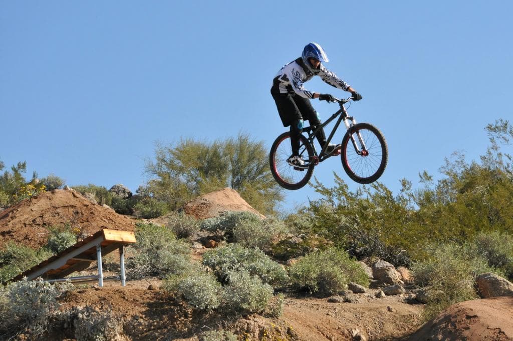 One of the first jumps off Double Trouble Black Diamond Flow Trail.