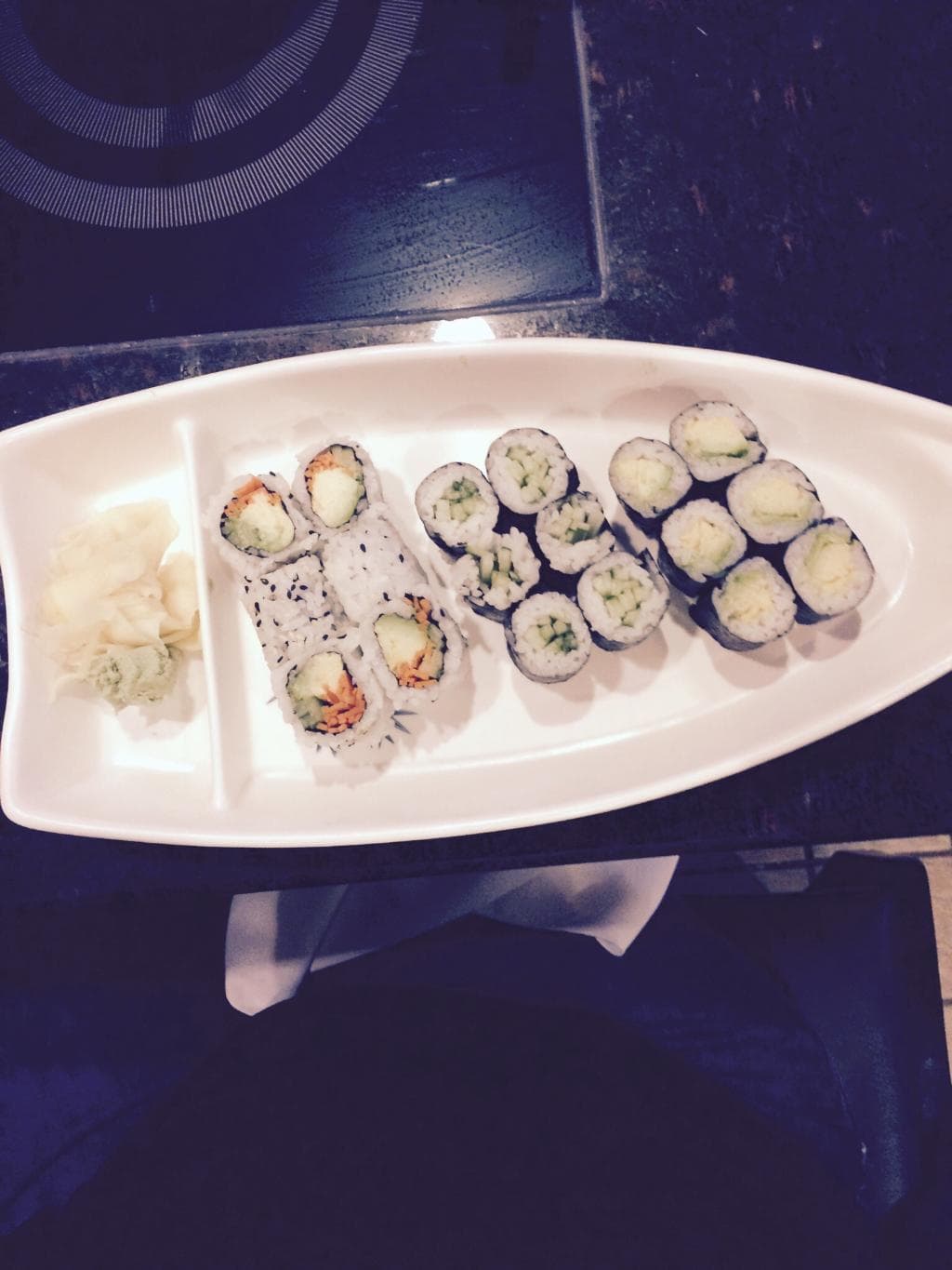 Vegetable rolls presented in a boat