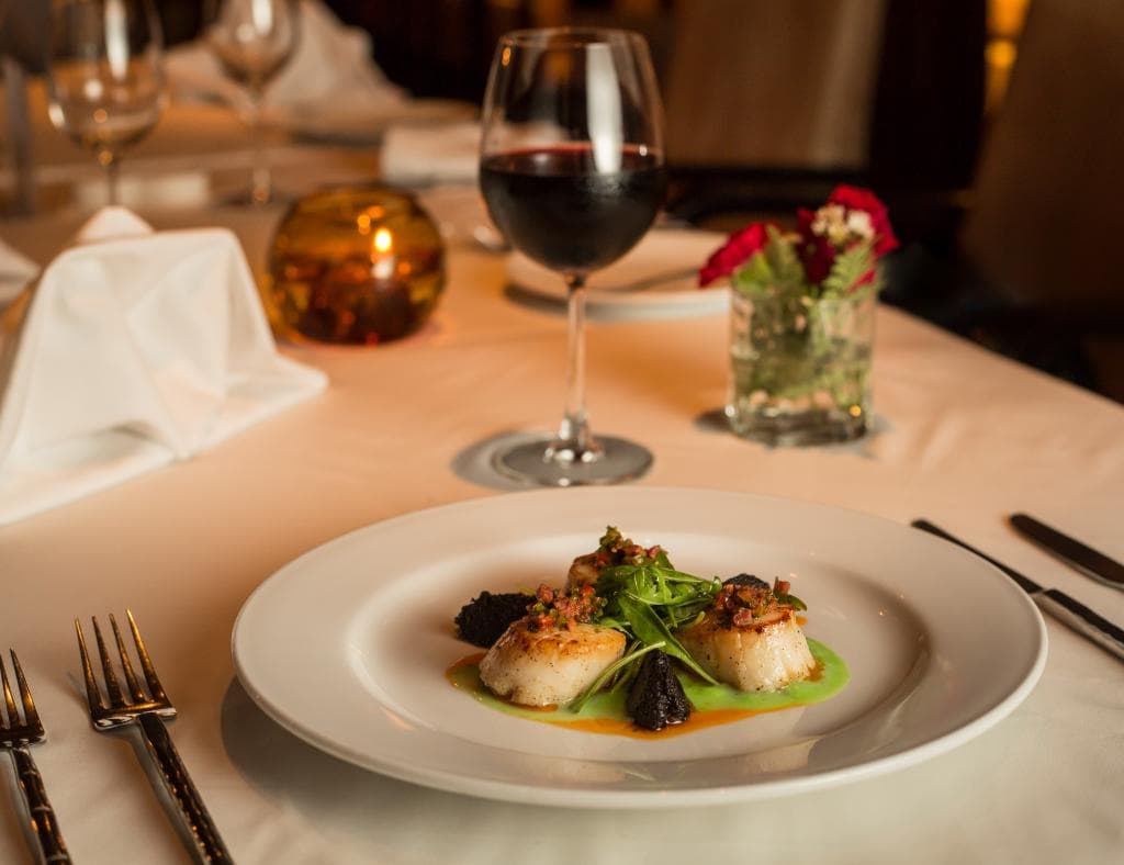 Japanese Scallops with crispay Black Pudding, Chorizo, Apple Puree and fresh Rocket