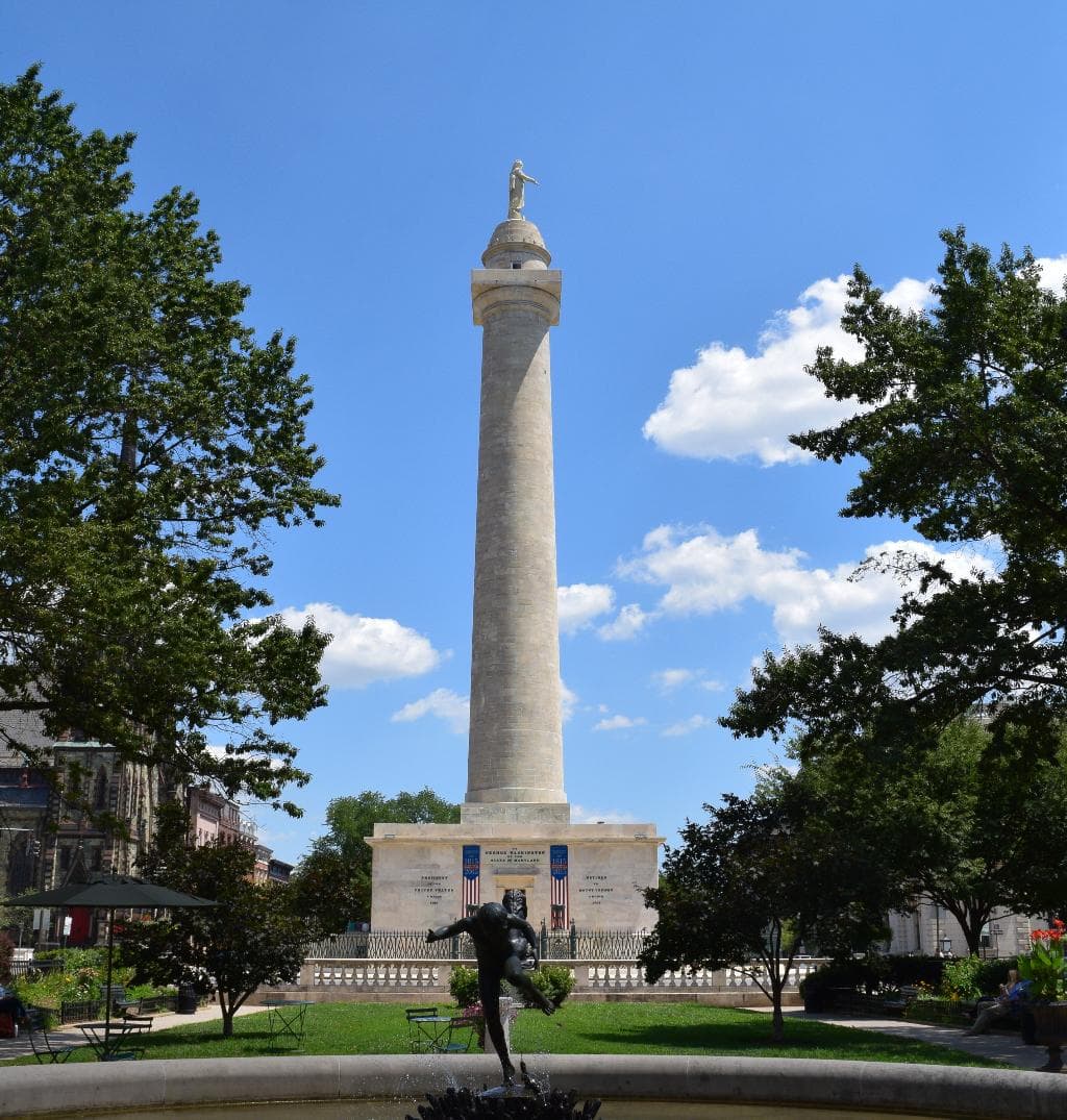 The main view of the monument from N Charles St