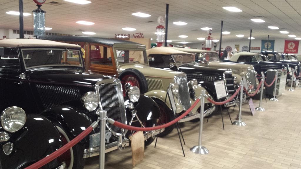 A lineup of cars in the Antique Car Museum