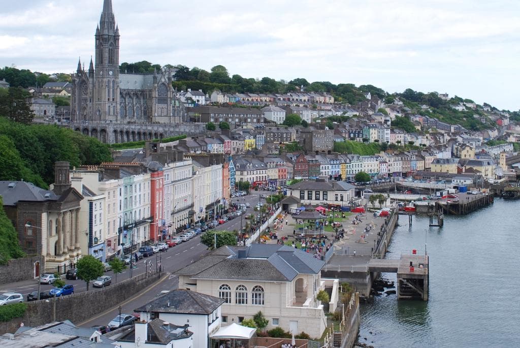 Yellow Arts & Tourist Centre building near Cobh Pier and Park.