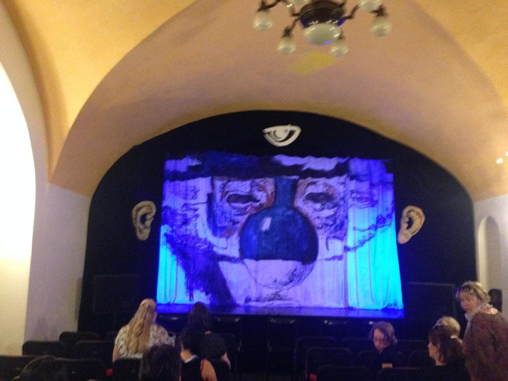 Enjoy a performance at the Black Light Theatre