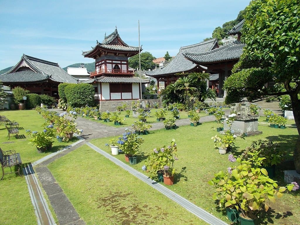 View of the beautiful front temple grounds with the tower-like building
