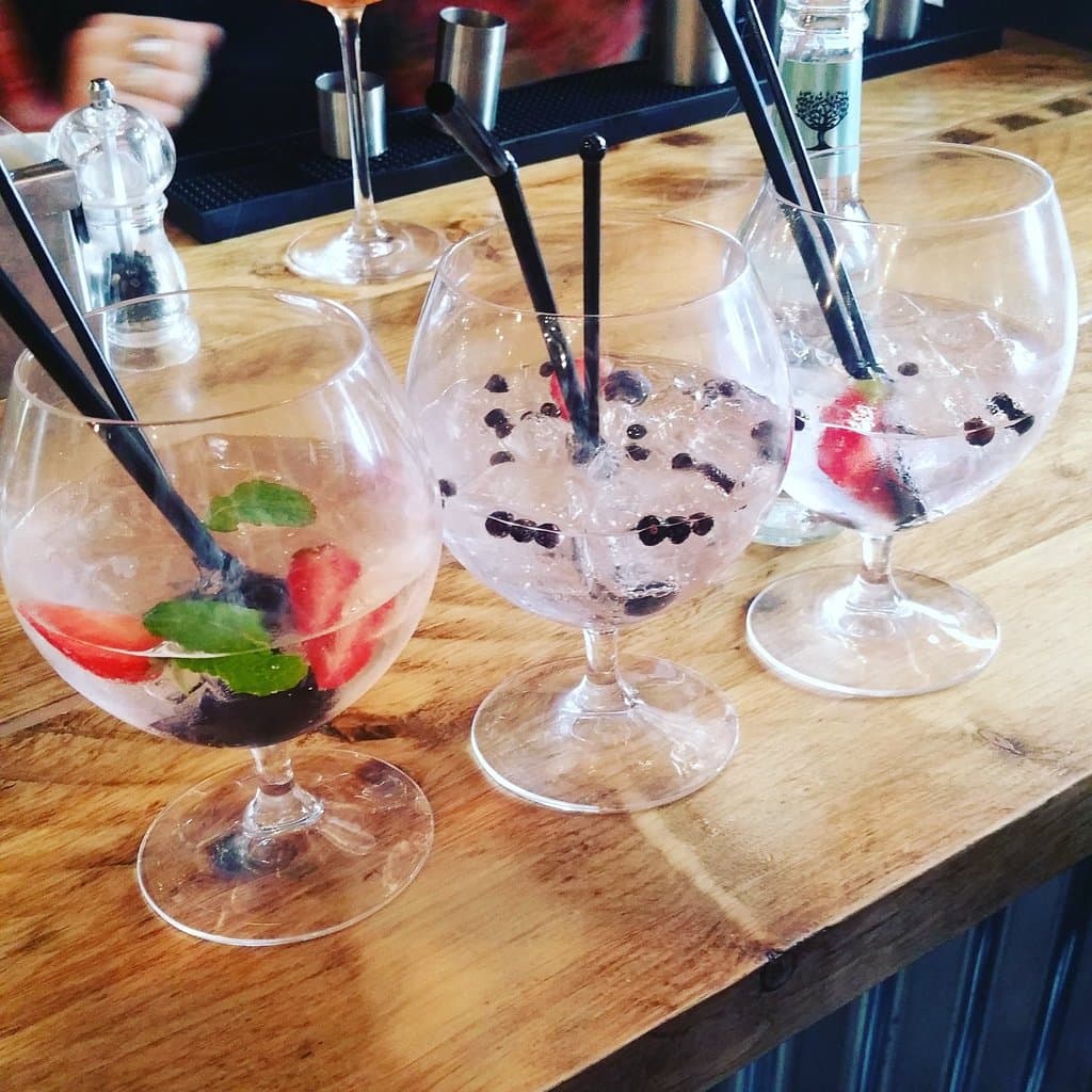 A selection of our gin and tonics with strawberries in
