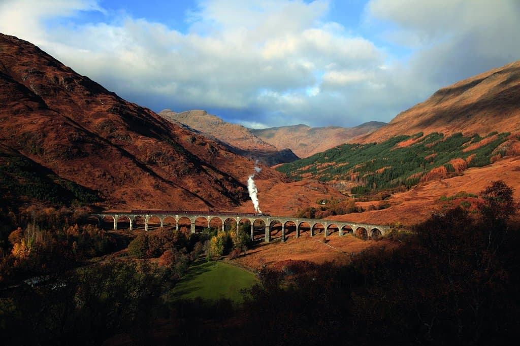 Golden colours high above Glenfinnan Viaduct with last Jacobite in 2012.