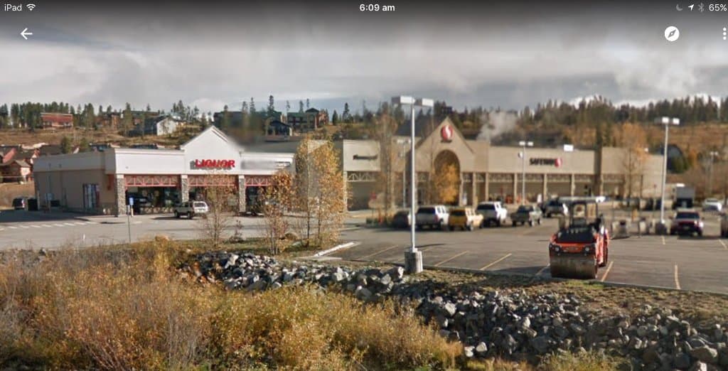 View from near the traffic lights of bottle shop and Safeway