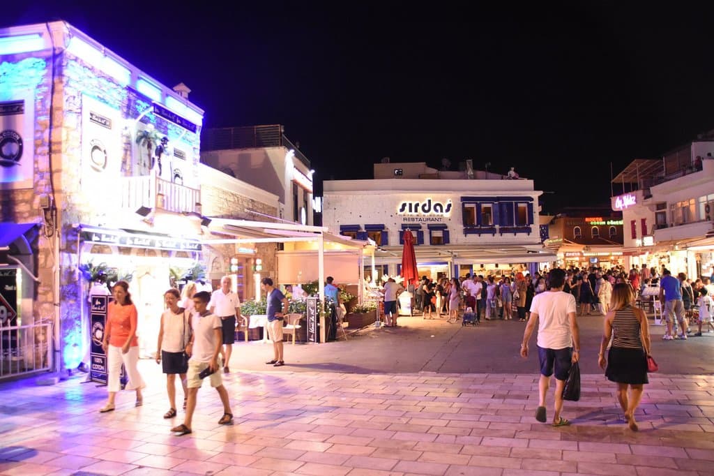 PAST THE SHOPS INTO THE SQUARE