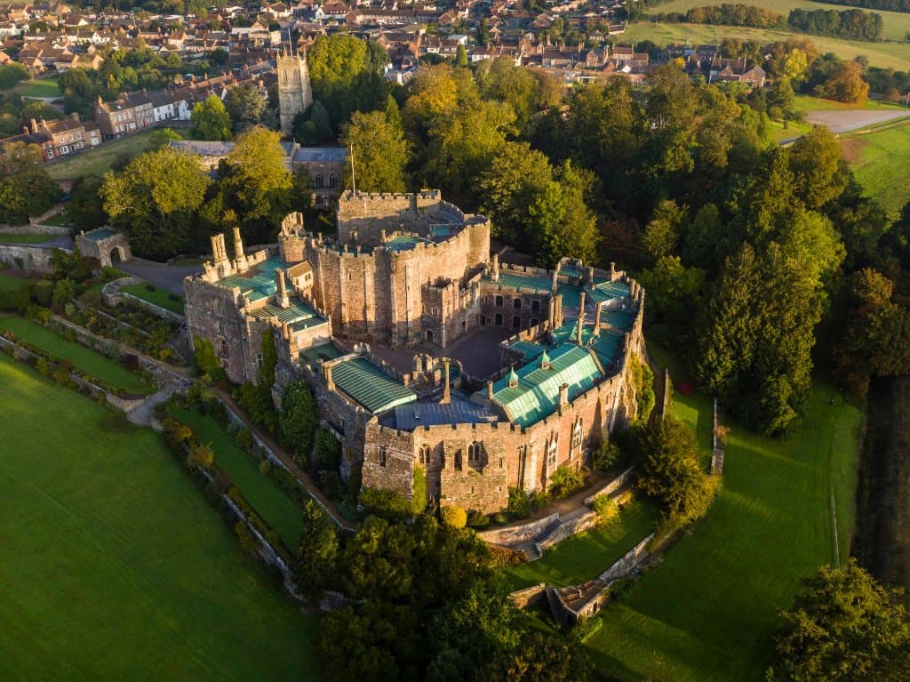 Stunning aerial view of Berkeley Castle and the adjoining town.