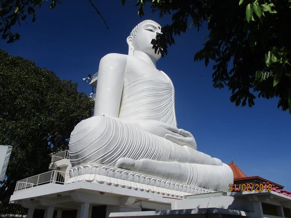 the Buddha, notice the steps behins and viewing platform